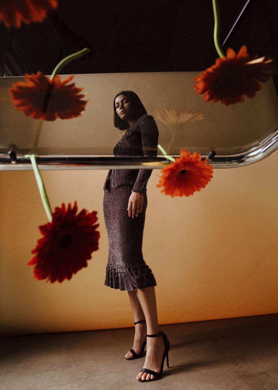 JDVK editorial set design with suspended gerbera floral installation